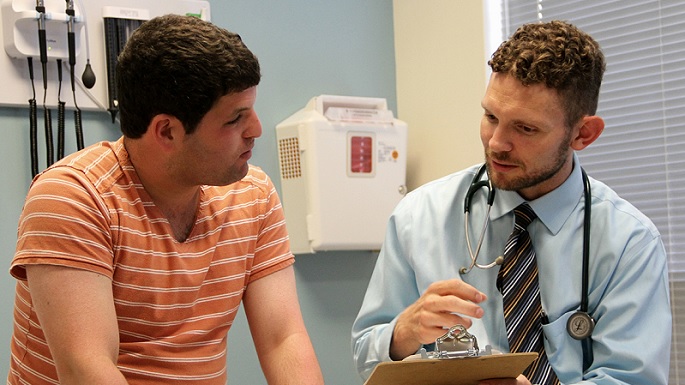 Teen with Doctor - credit: Ohio State Wexner Medical Center