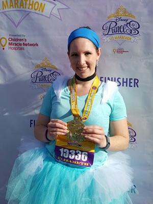 finishing my first Disney Princess Half Marathon in 2016